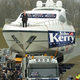 Kerry waves down to a crowd of supporters.